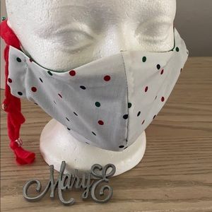 Dot face mask blue red green on white background